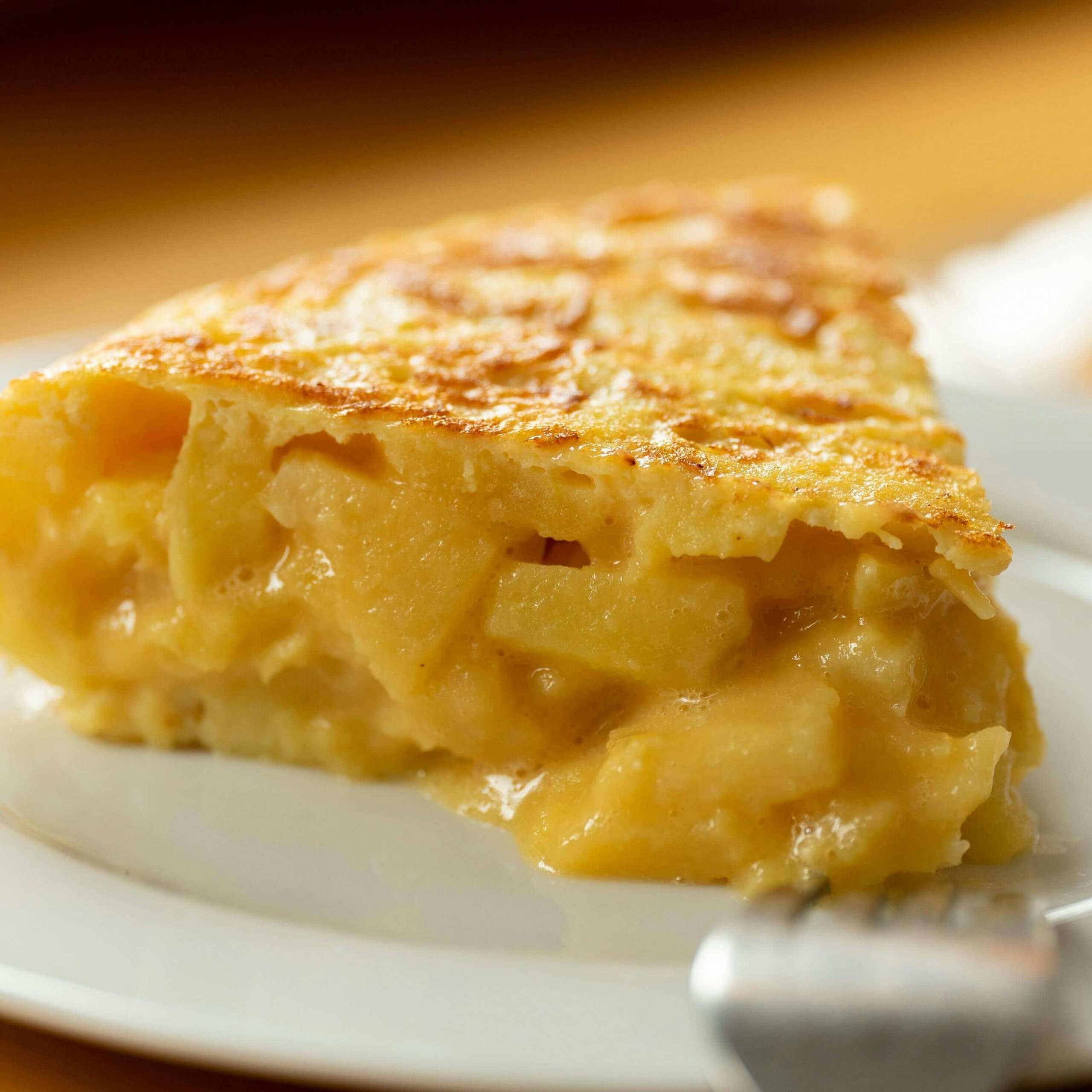 Spanische Tortilla Rezept - Tortilla aufgeschnitten – Blick auf das cremige Innere